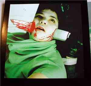 Wolf Eyes / Panicsville - Stabbed In The Face
