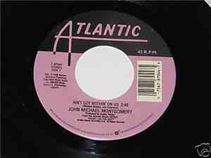 John Michael Montgomery - Ain't Got Nothin' On Us / I Miss You A Little