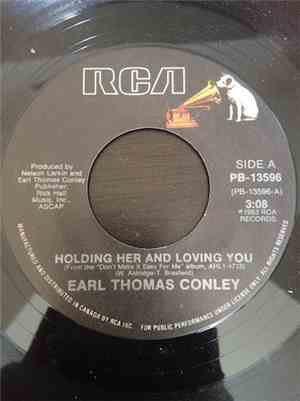 Earl Thomas Conley - Holding Her And Loving You / Home So Fine